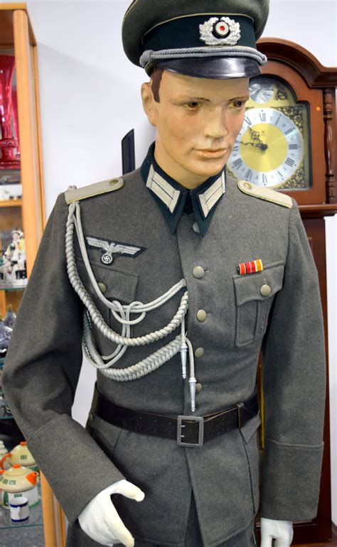 Alloriginal buttons original suspenders remain on these breeches. . German officer uniform ww2